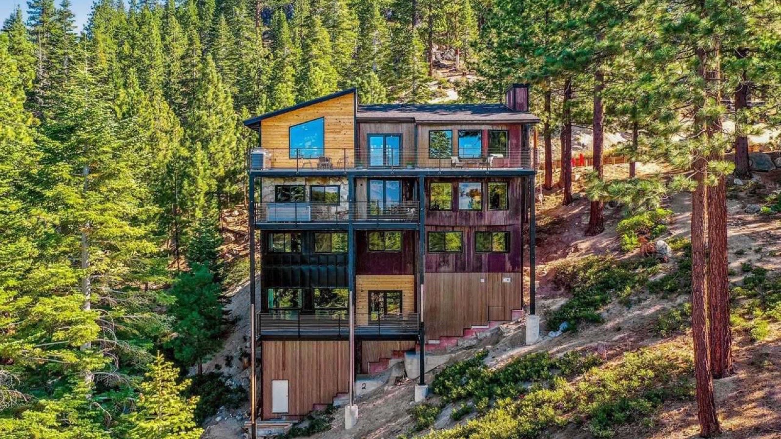 South Lake Tahoe waterfront with pine trees and clear blue water — Al Tahoe and Bijou neighborhoods California Nevada